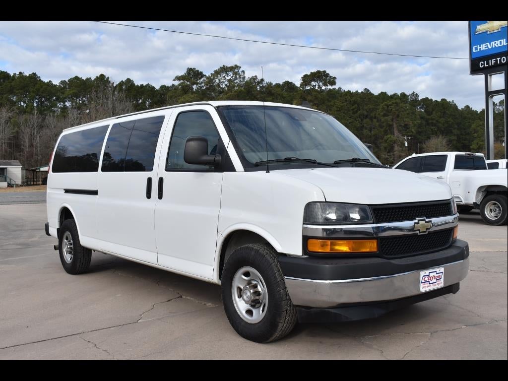 2019 Chevrolet Express Passenger 3500 LT in Summit White — front three-quarter view