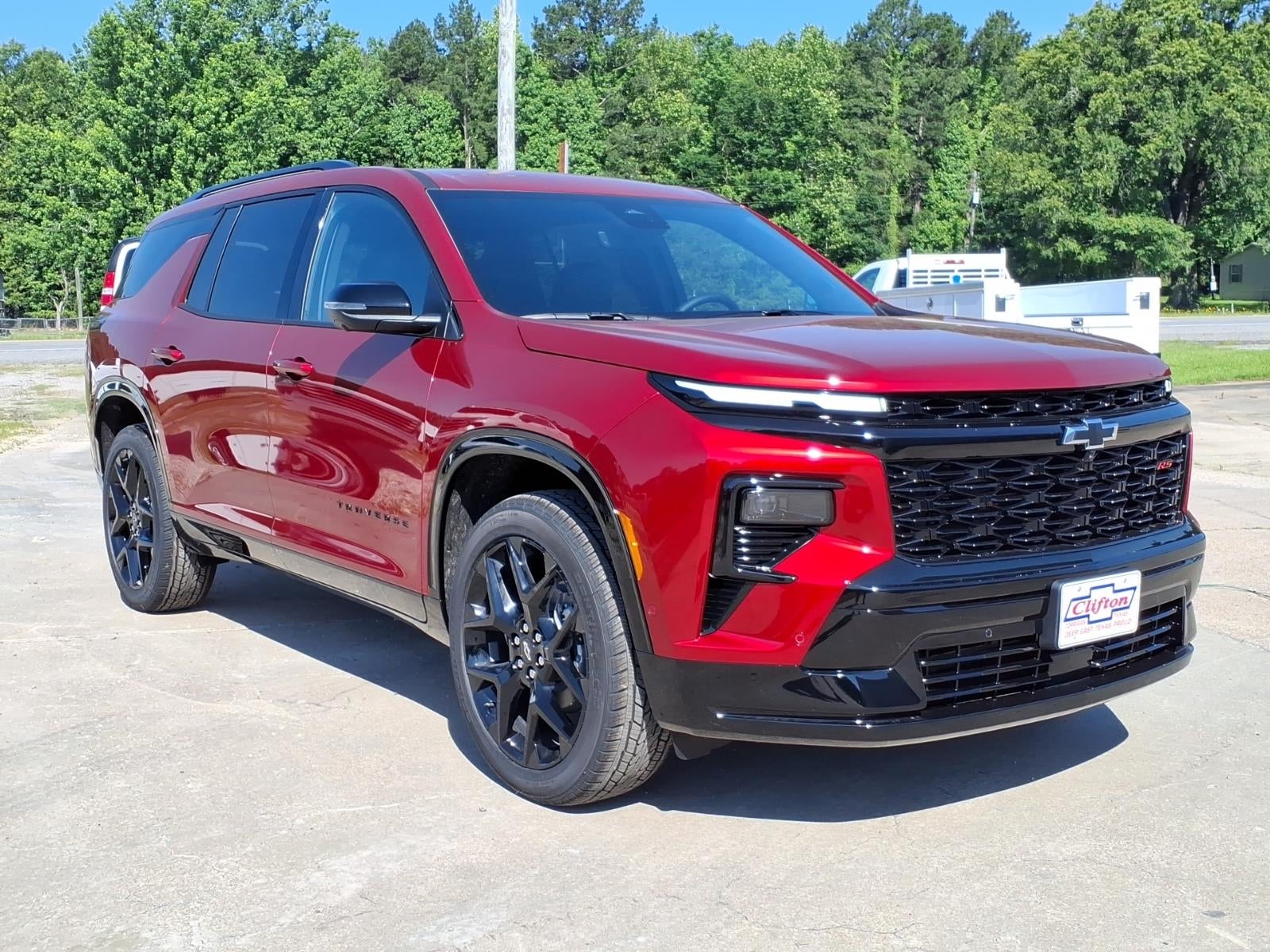 2026 Chevrolet Traverse RS in Radiant Red Tintcoat — front three-quarter view