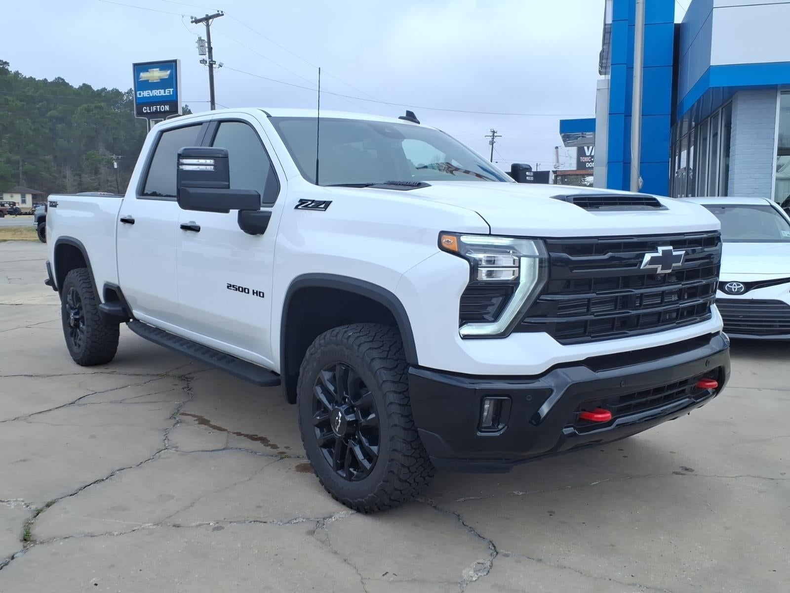 2026 Chevrolet Silverado 2500 HD LT in Summit White — front three-quarter view